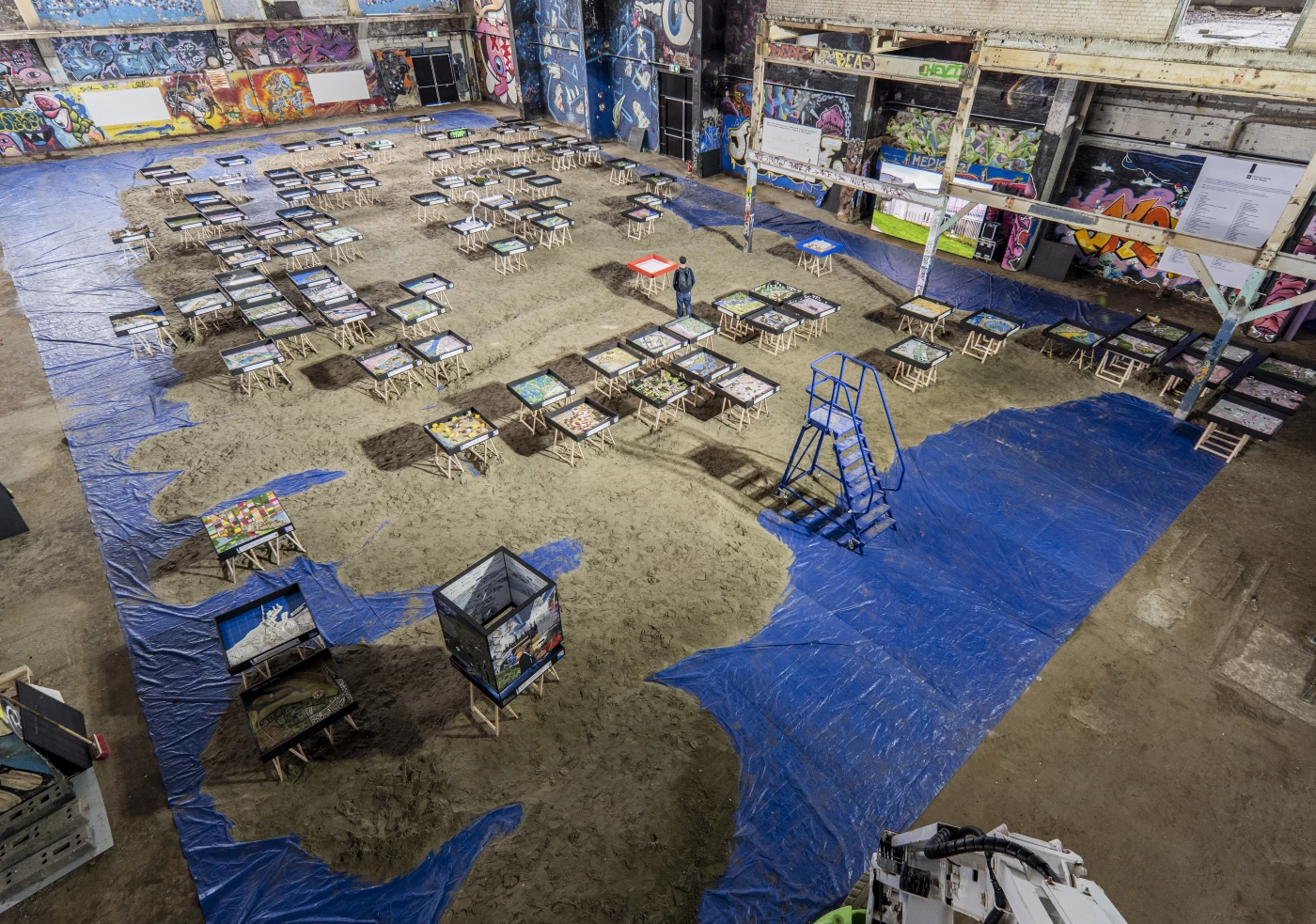 Birds eye view of the 101 proposals united in the biggest scale model of the Netherlands at IABR 2022 in Rotterdam